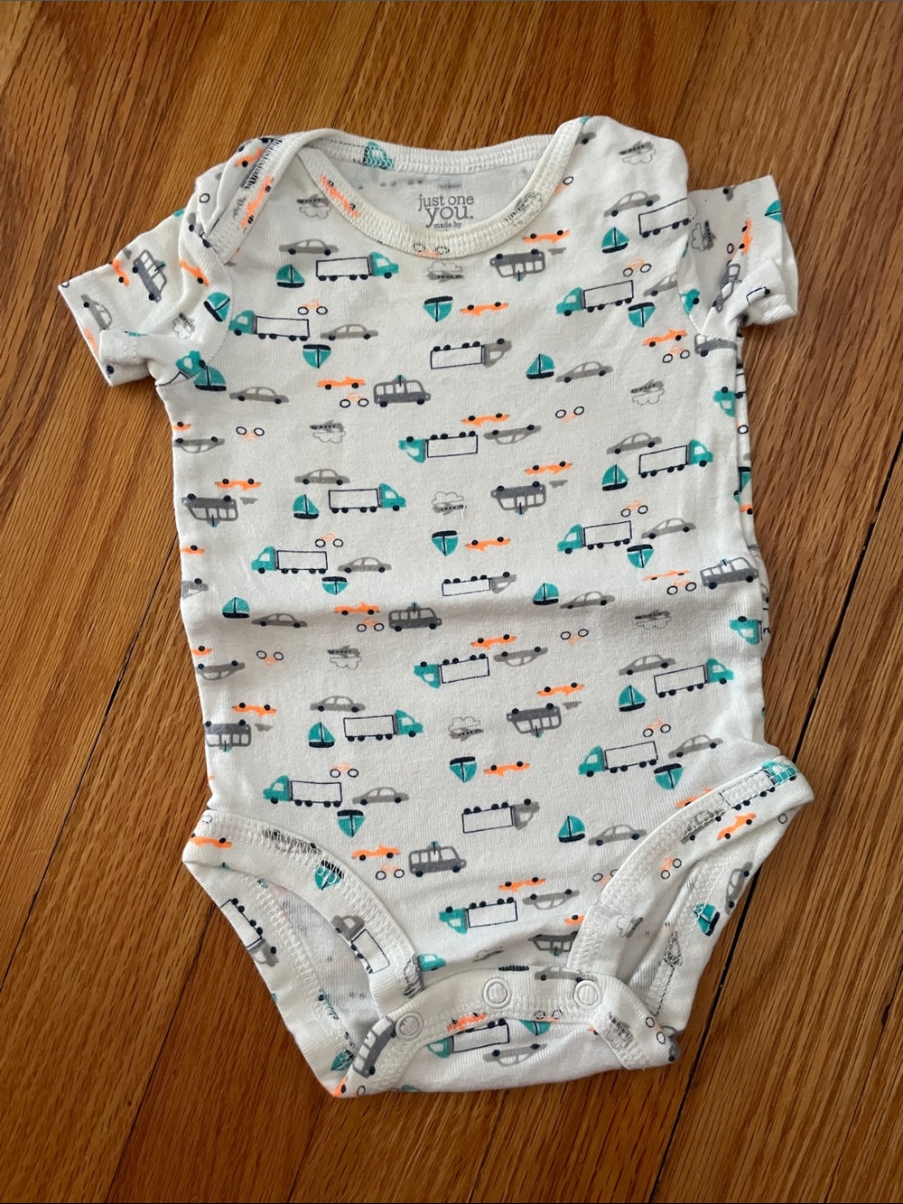 Carter's White Baby Bodysuit with Teal & Orange Vehicle Print